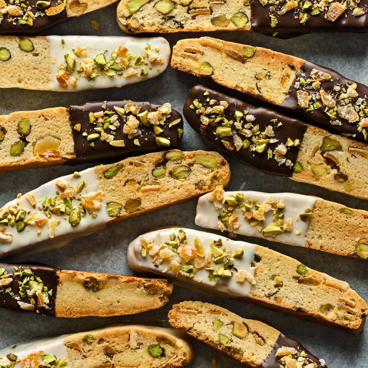 Overhead view of biscotti set atop a sheet pan.