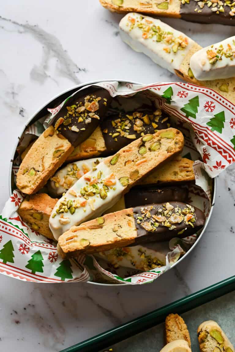 Overhead view of biscotti in a tin.
