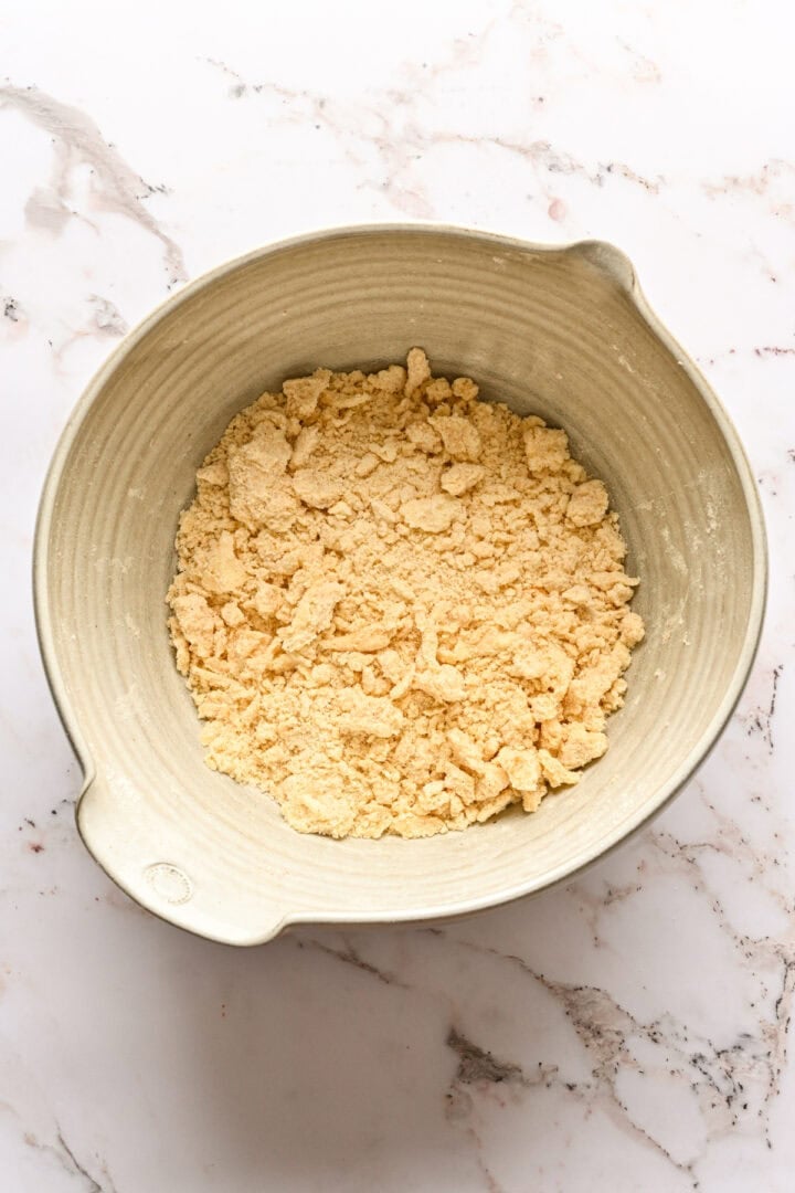 Overhead view of dough after mixing together butter flour and spices