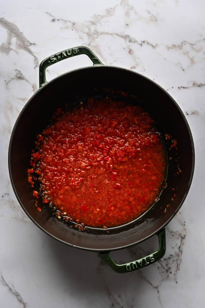 Overhead view of diced red pepper after immersion blending.