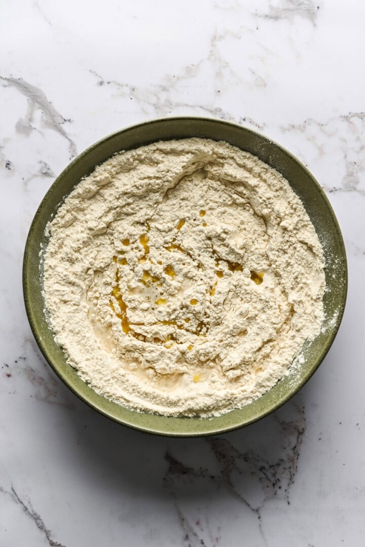 flour mixture with water and olive oil added before mixing.
