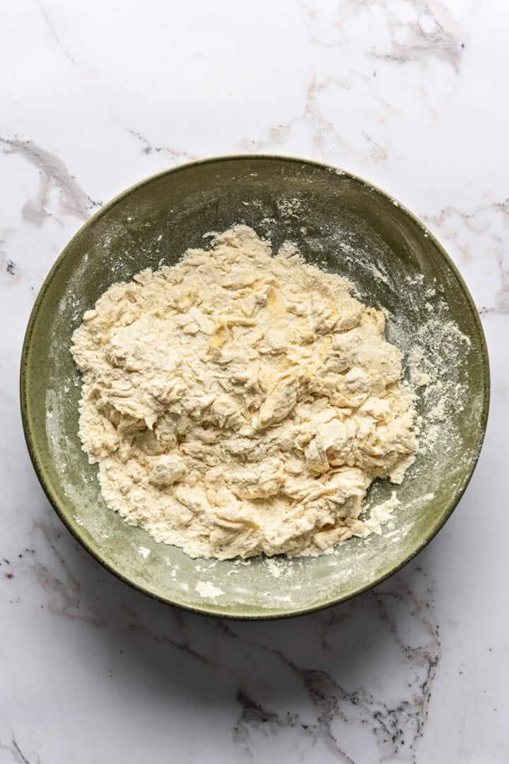 cracker dough mixed together in a shaggy dough.