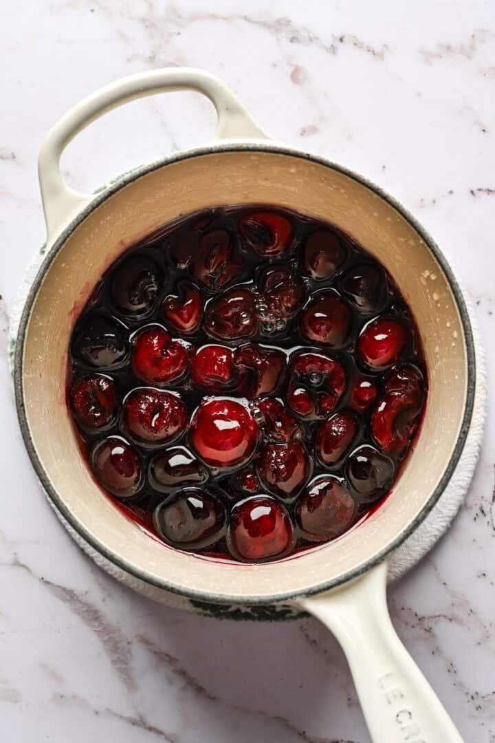 Cocktail cherry ingredients in saucepan before simmering.