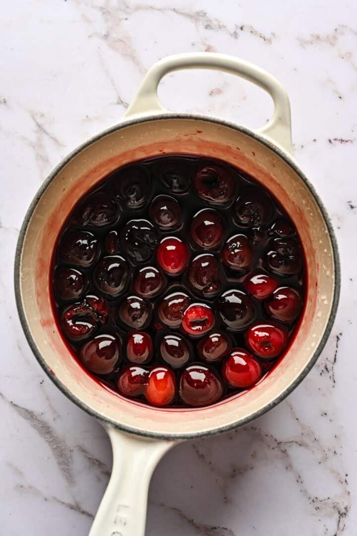 Cocktail cherry ingredients in saucepan after simmering.