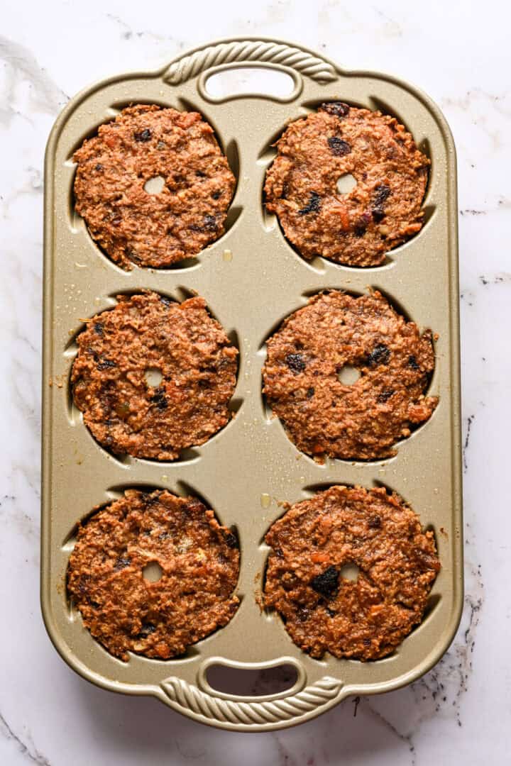 Figgy pudding in bundt tins after baking.