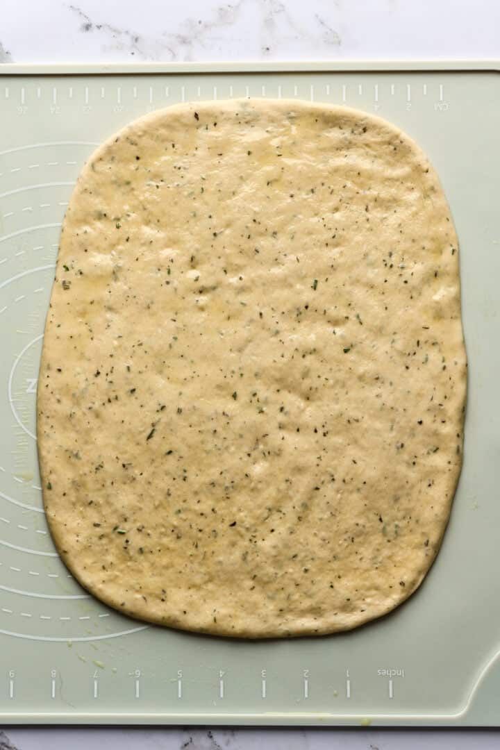 Dough pressed into a rectangle.