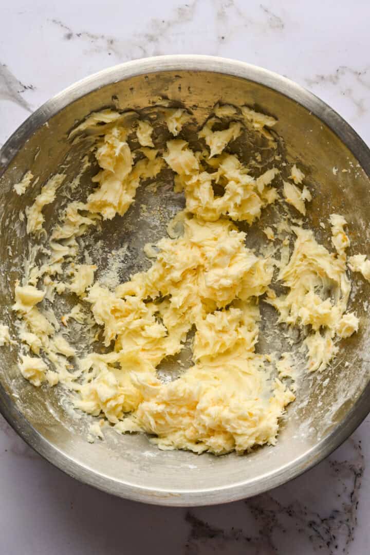 butter and sugar creamed in a bowl.