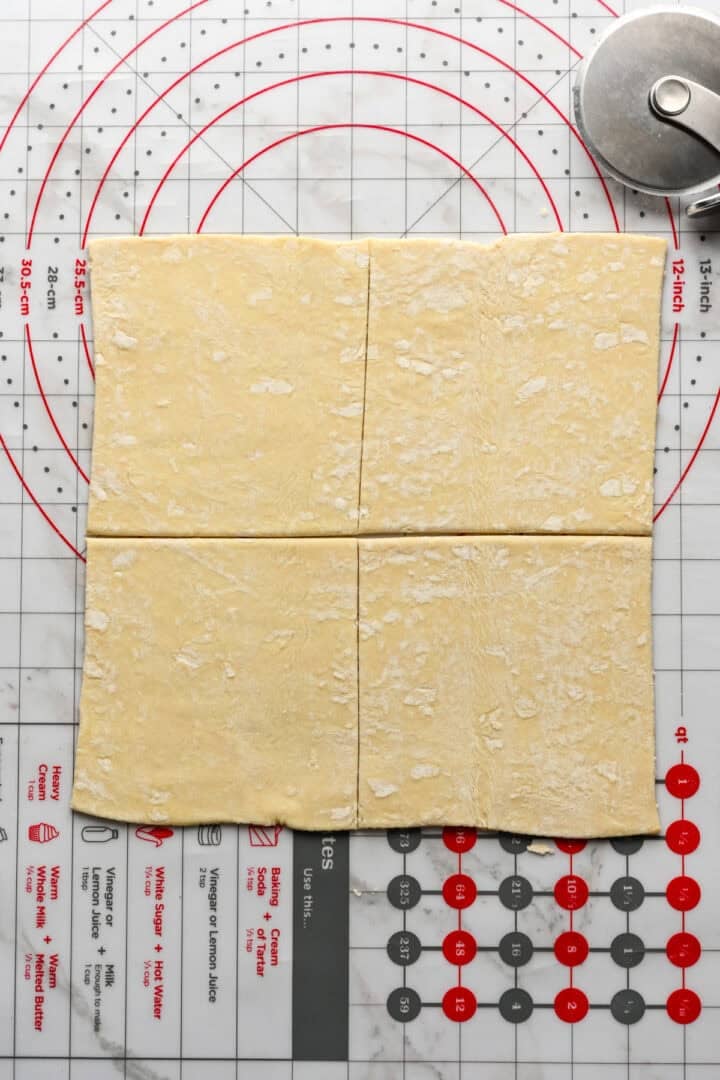 Overhead view of puff pastry cut into 4.