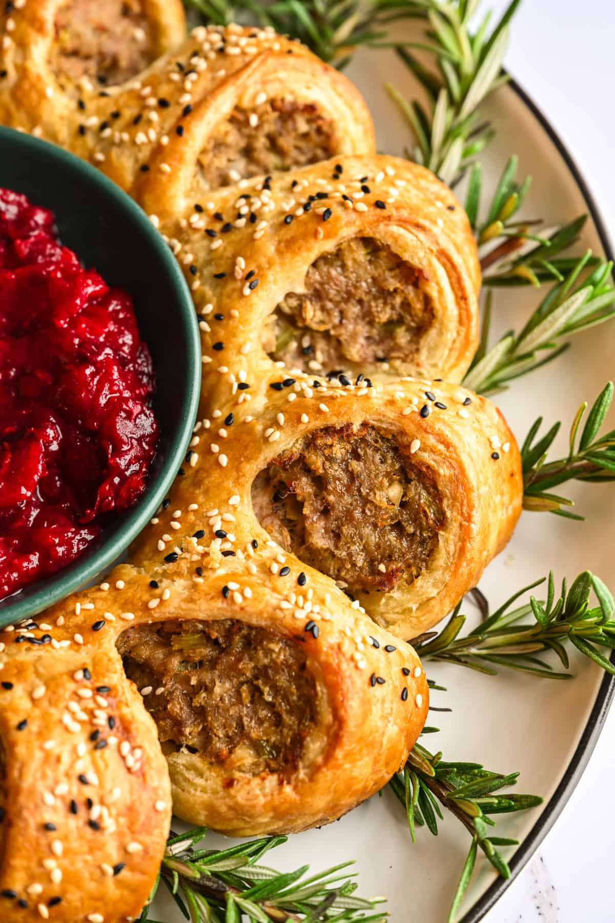 Close up view of a section of the sausage roll wreath.