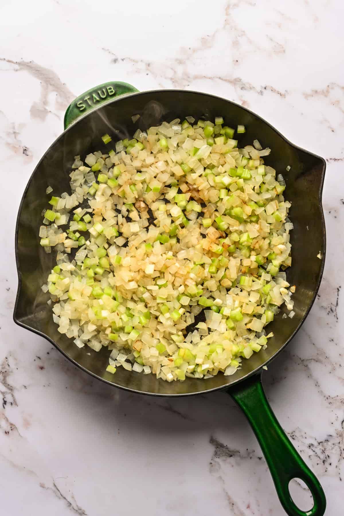 sauteed onion, garlic and celery in a skillet.