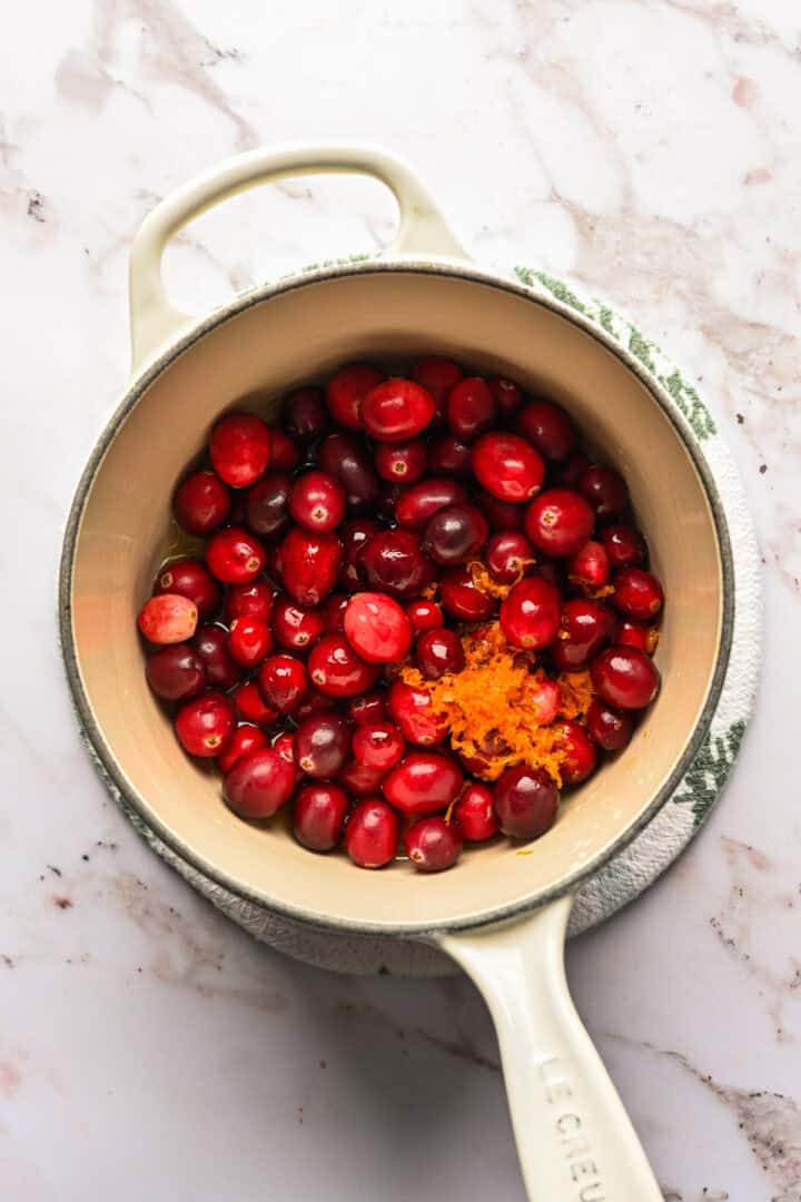 cranberry sauce ingredients in a pot before cooking.