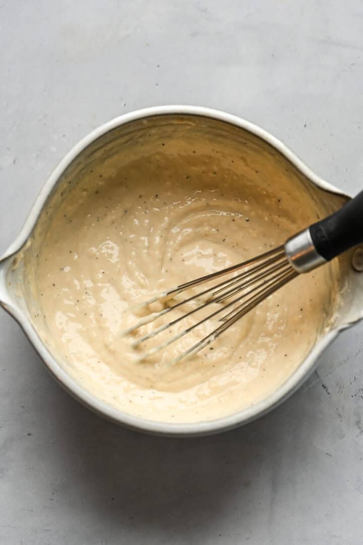 Caesar dressing after being mixed together.