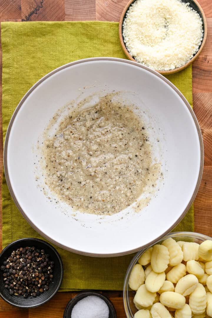 Melted butter, olive oil, parmesan, salt and pepper after mixing together.