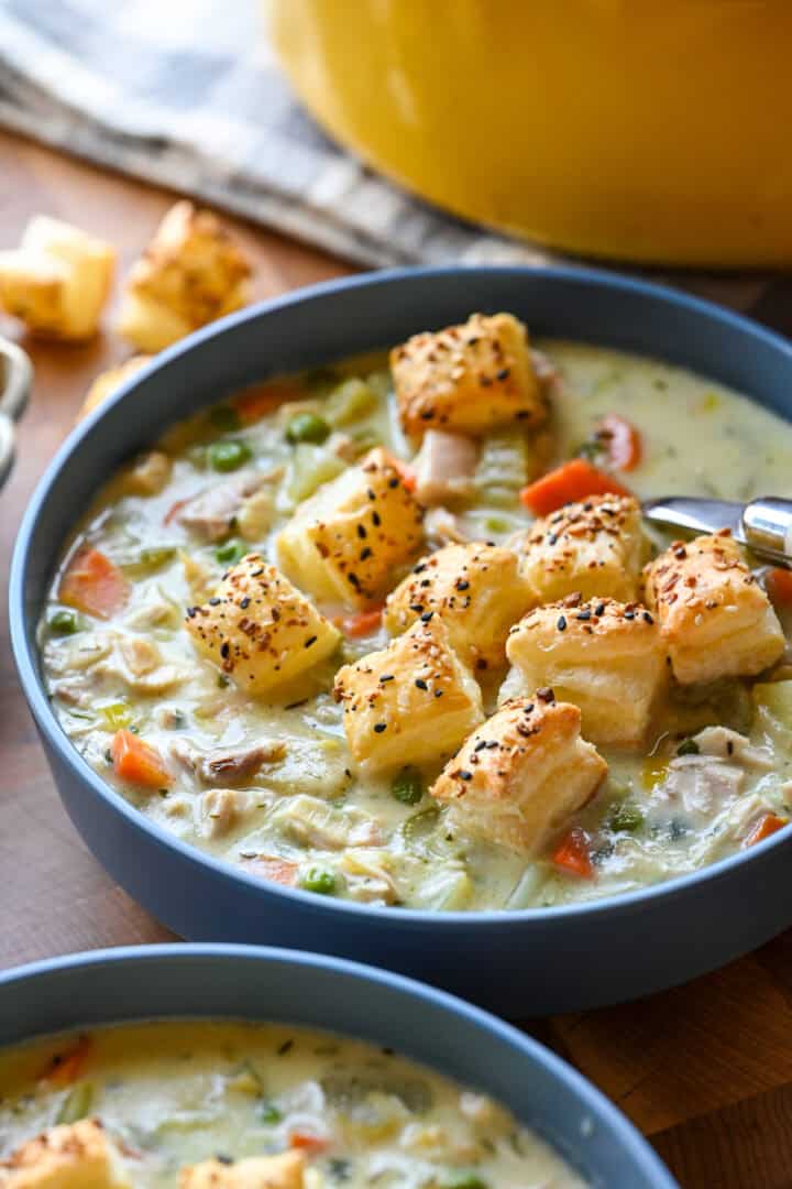 Front view of chicken pot pie soup in a bowl.