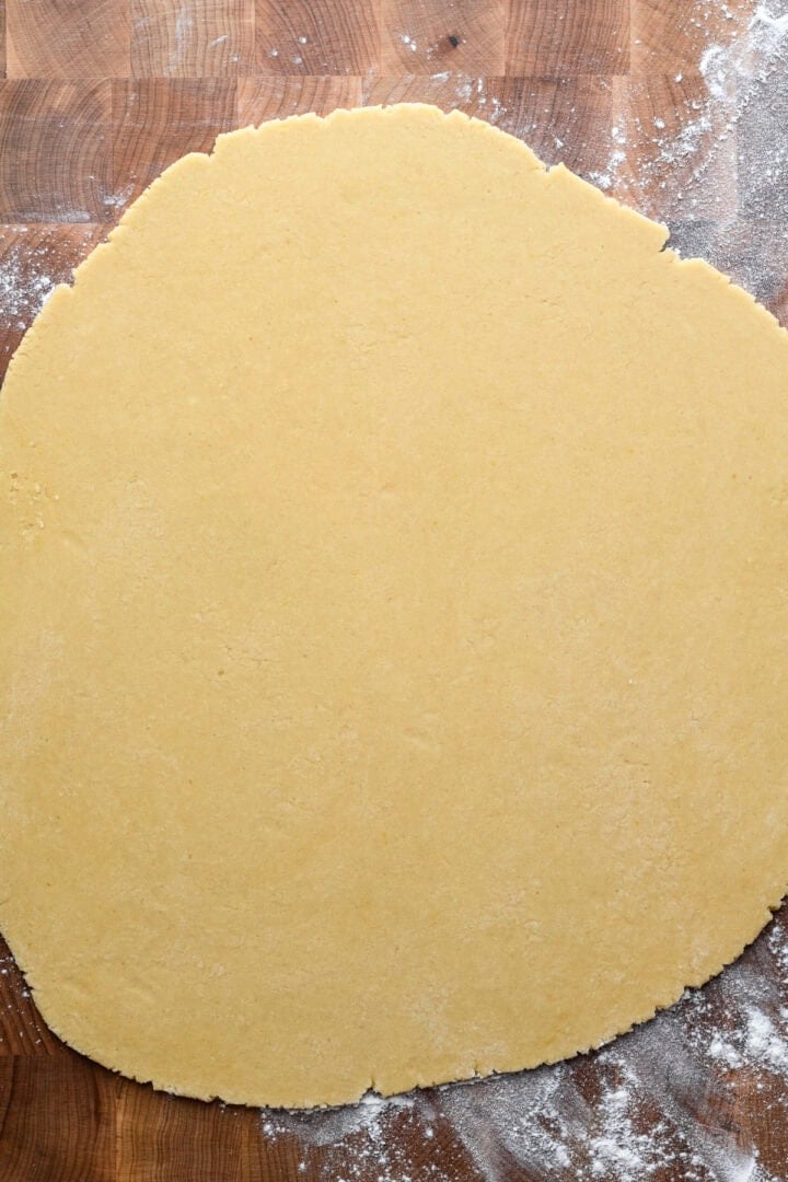 Overhead view of rolled out animal cookie dough.