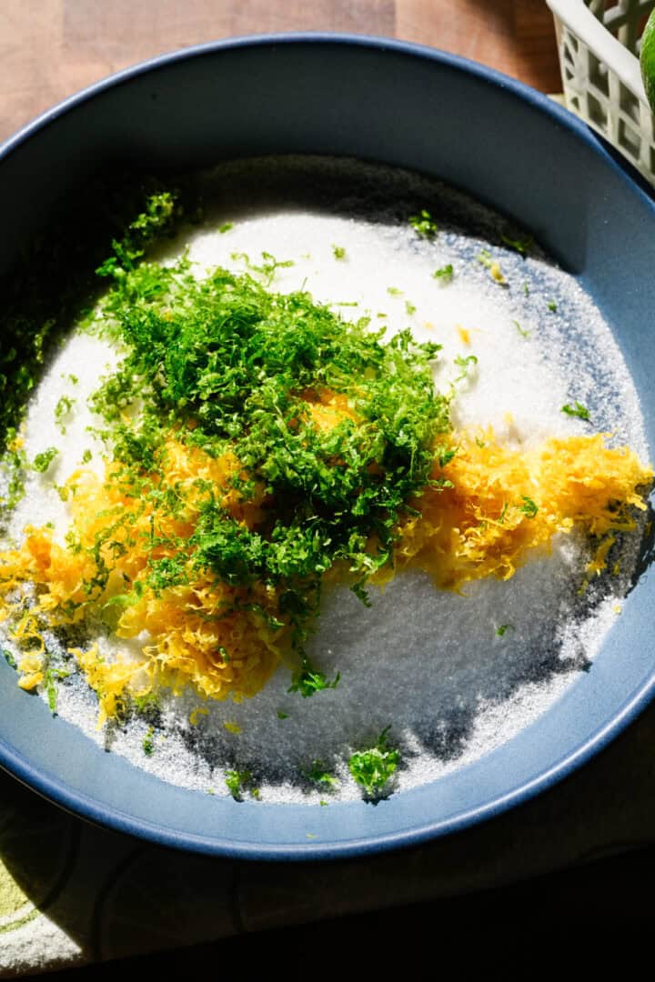 Lemon and lime zest before being massaged into the sugar.