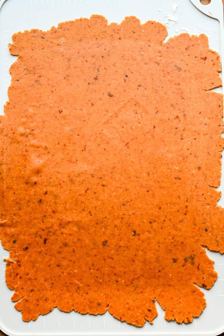 Pizza cheez it dough rolled into a sheet.