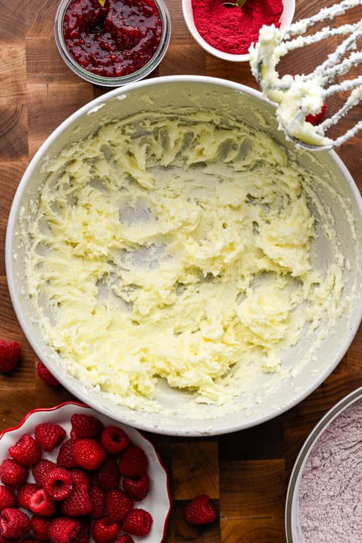 Butter and sugar creamed together in a bowl.