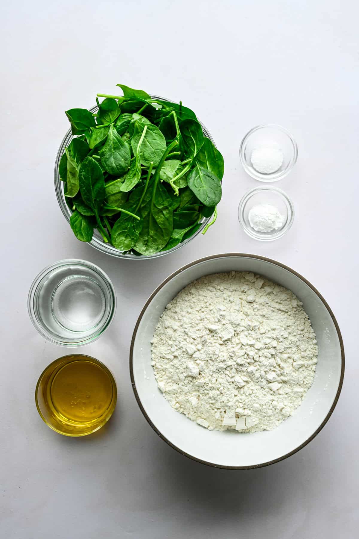 Overhead view of spinach tortilla ingredients.