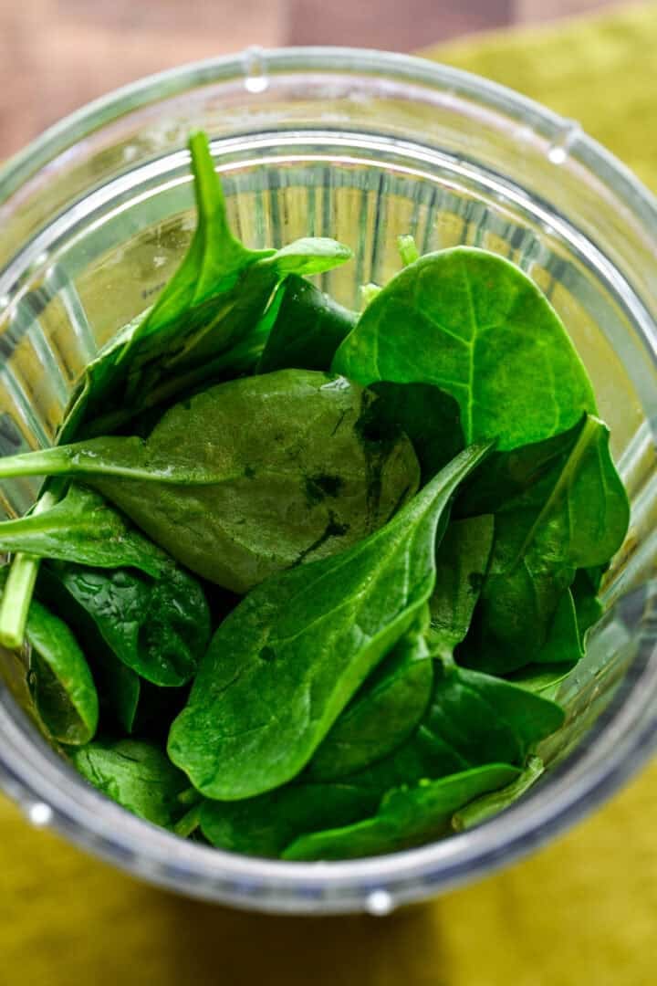 Overhead view of spinach before being blended.