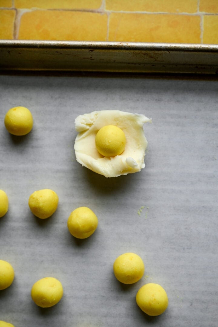Overhead view of truffle before wrapping yellow center.