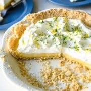 Side view of atlantic beach pie with a few slices taken out of pie tin.