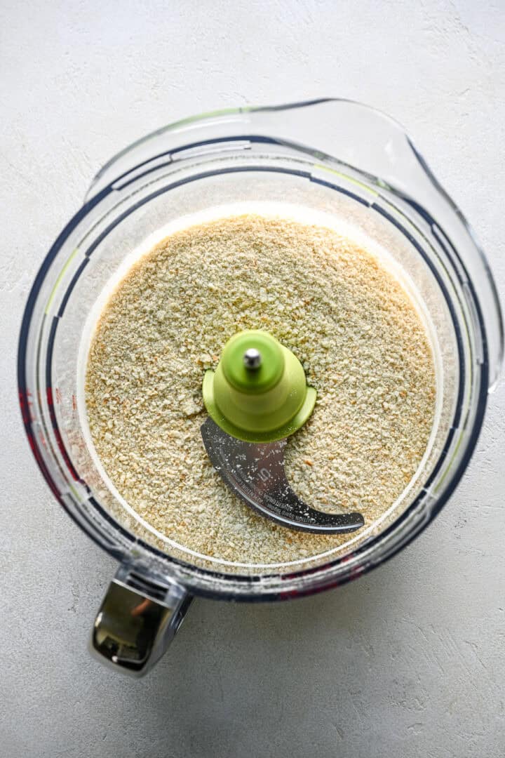 Saltine cracker crumbs in food processor.