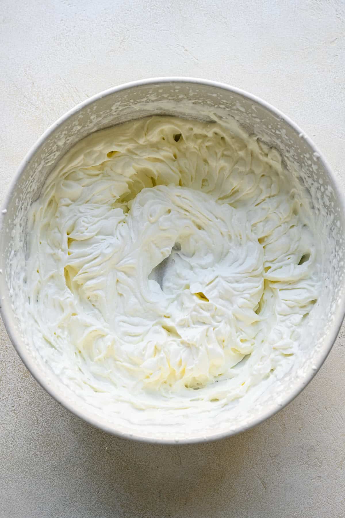 Whipped cream in a bowl.