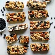 Overhead view of blueberry cashew KIND bar copycats on parchment paper.