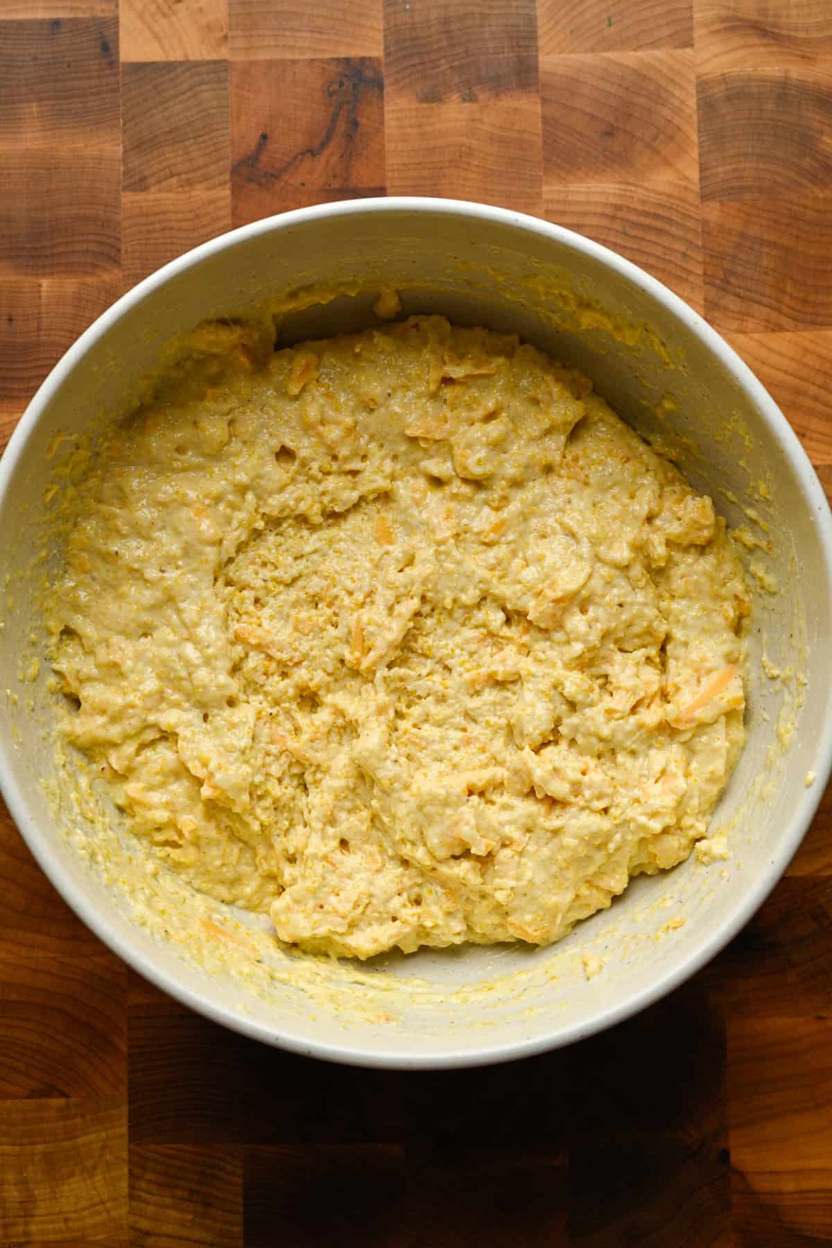 Cornbread batter mixed in a bowl.