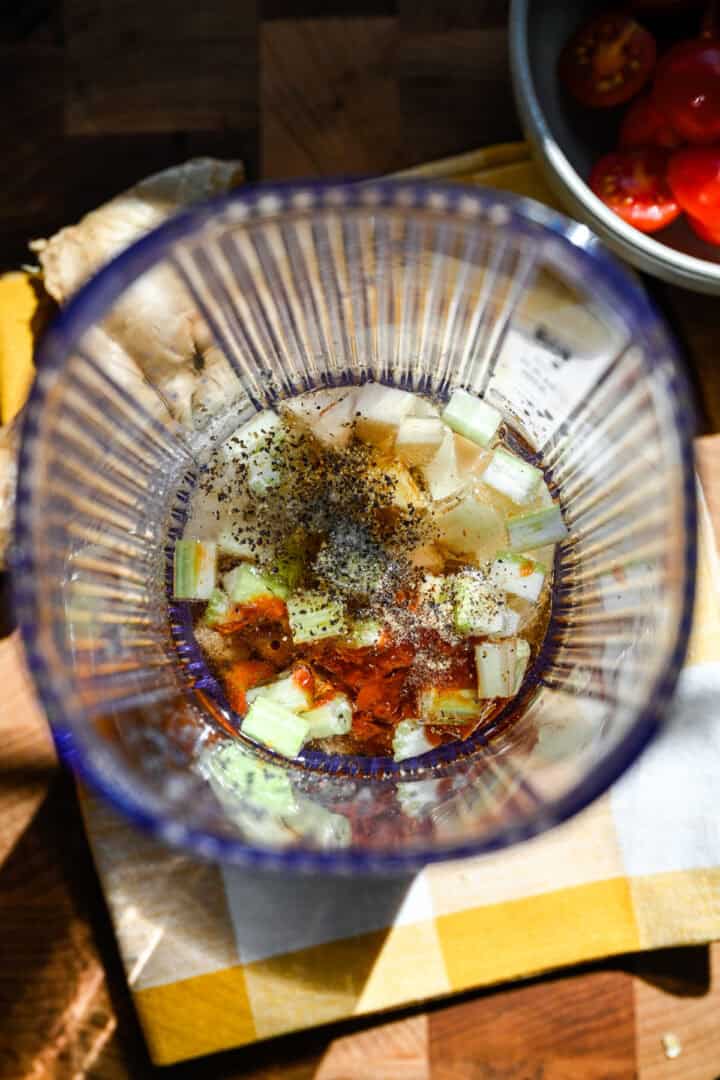overhead view of ginger dressing ingredients in a blender before blending.