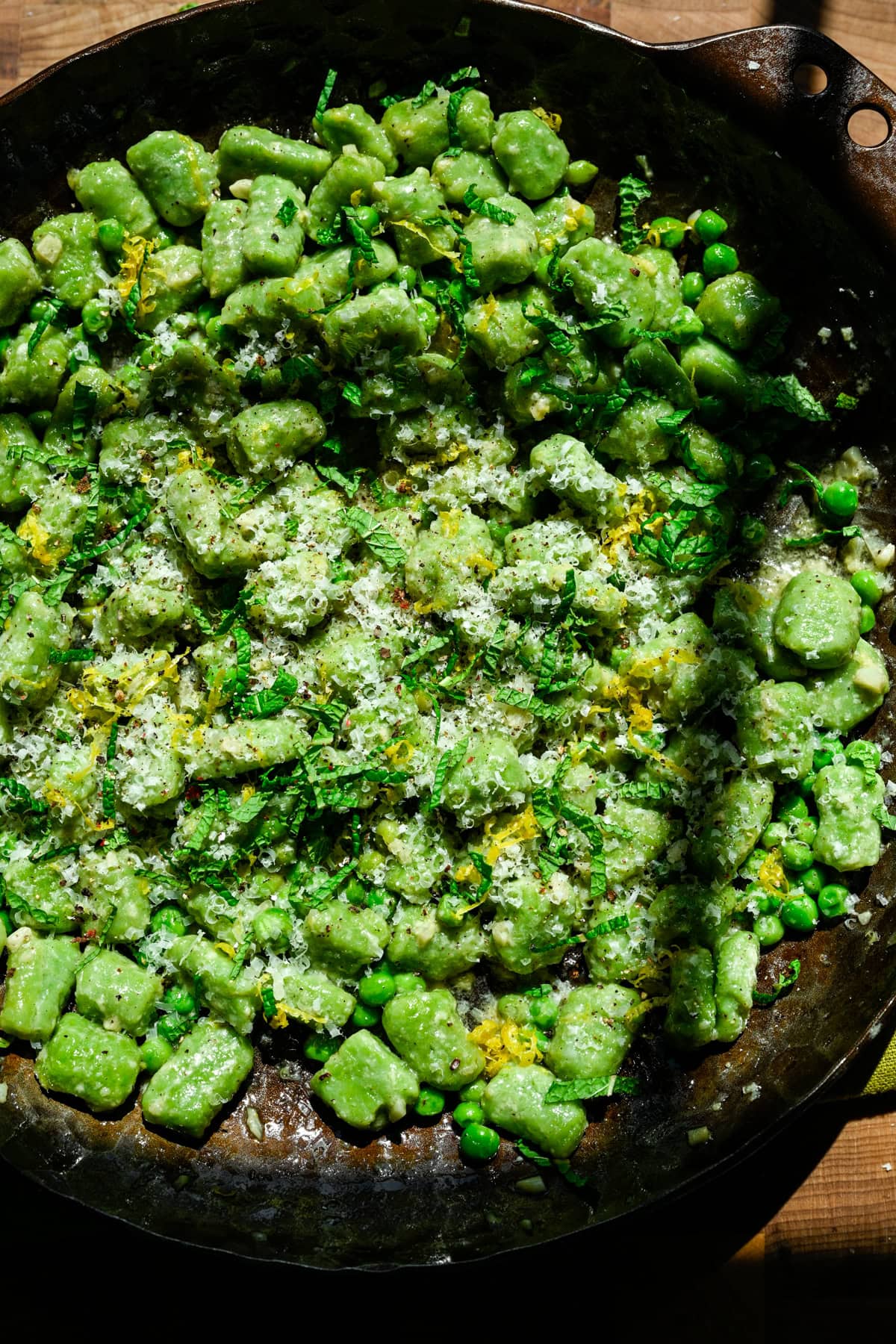 Overhead view of gnocchi in a pan.