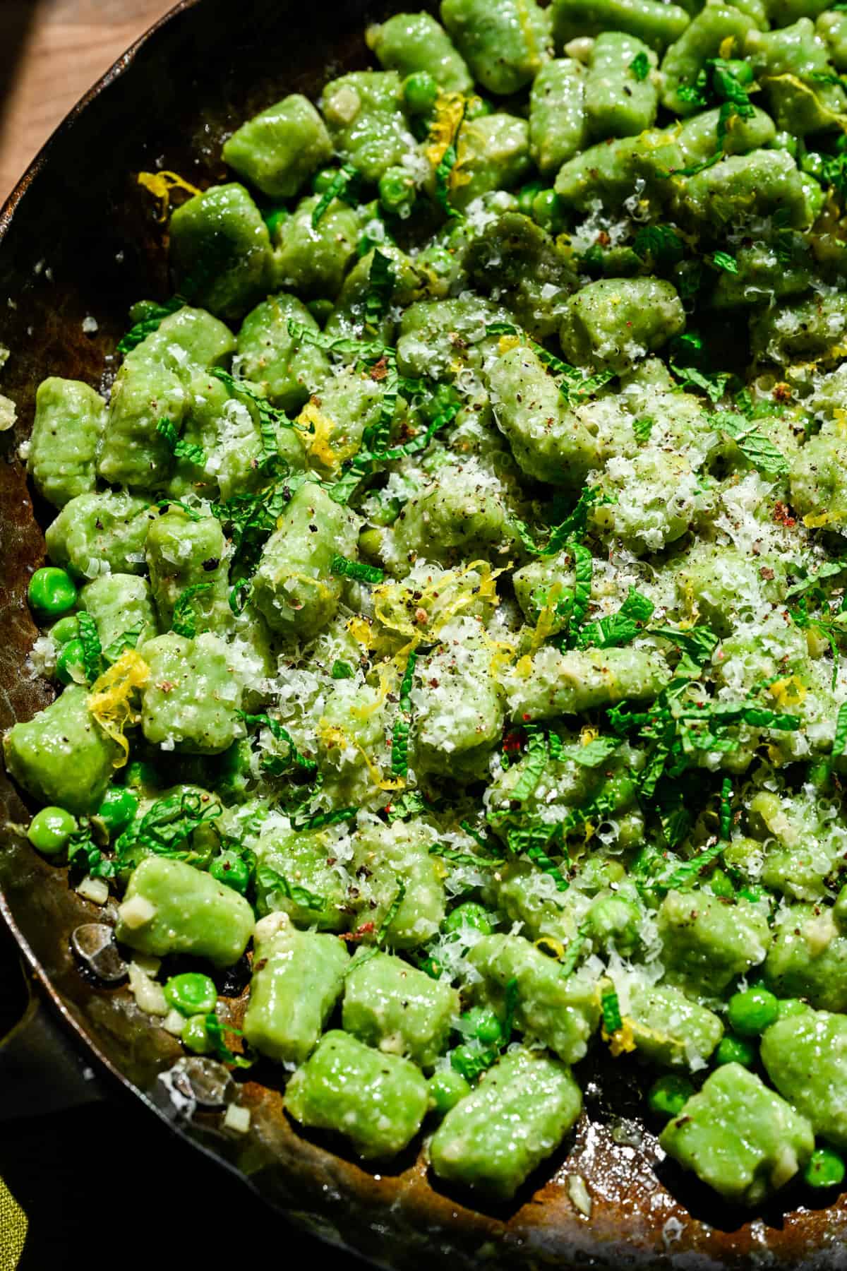 Overhead view of gnocchi in a pan.