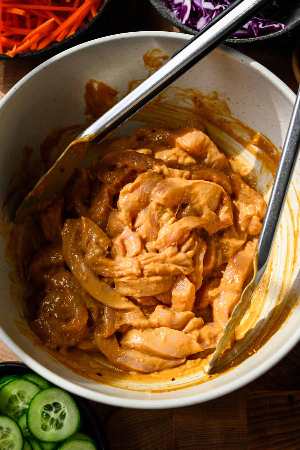 Overhead view of chicken in a bowl.