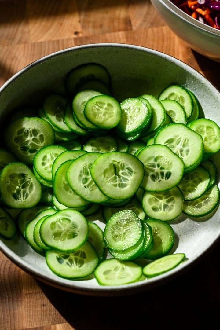 Overhead view of cucumber in a bowl.