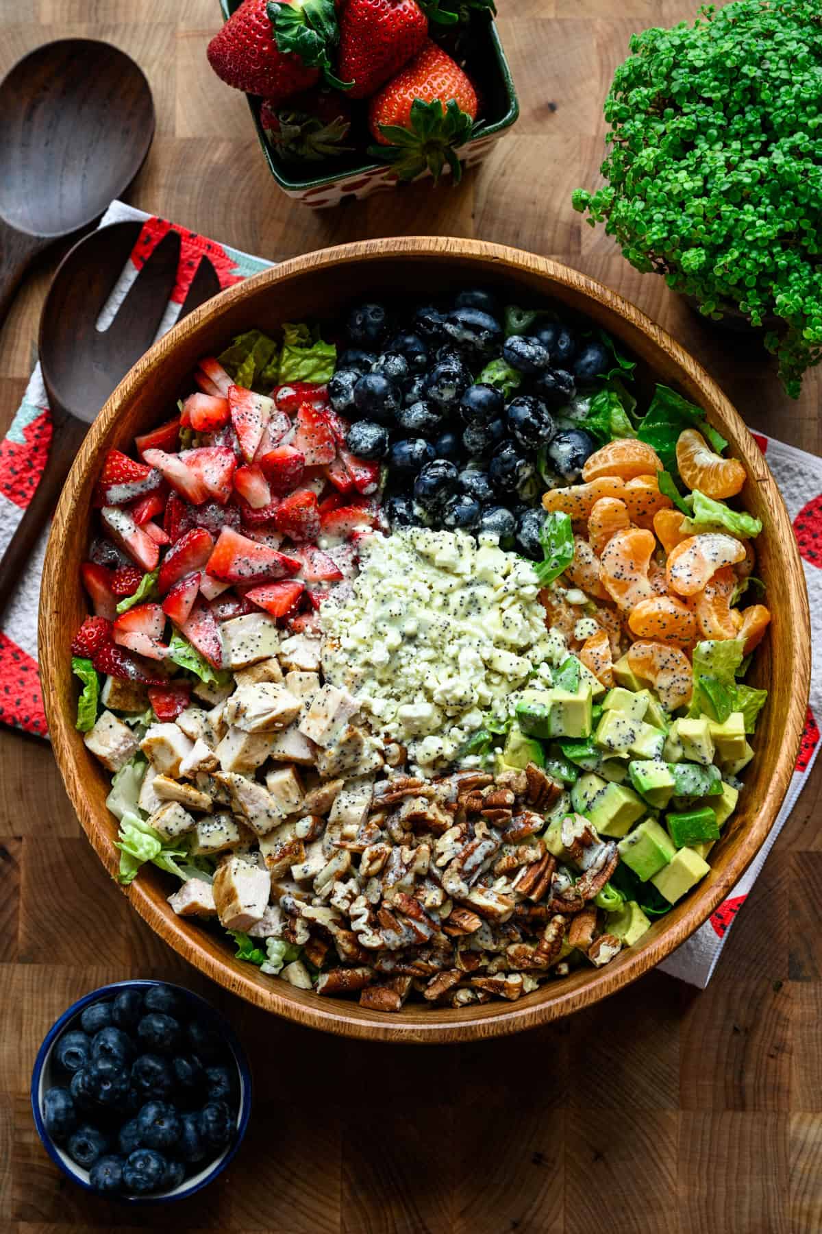 Overhead view of strawberry salad in a bowl.