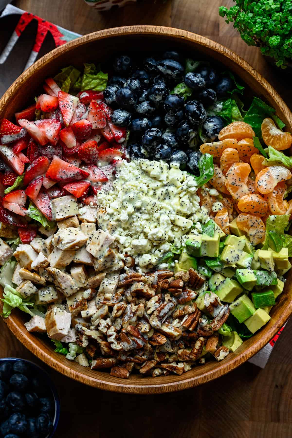 Overhead view of strawberry salad in a bowl.