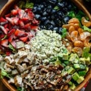Overhead view of strawberry salad in a bowl.