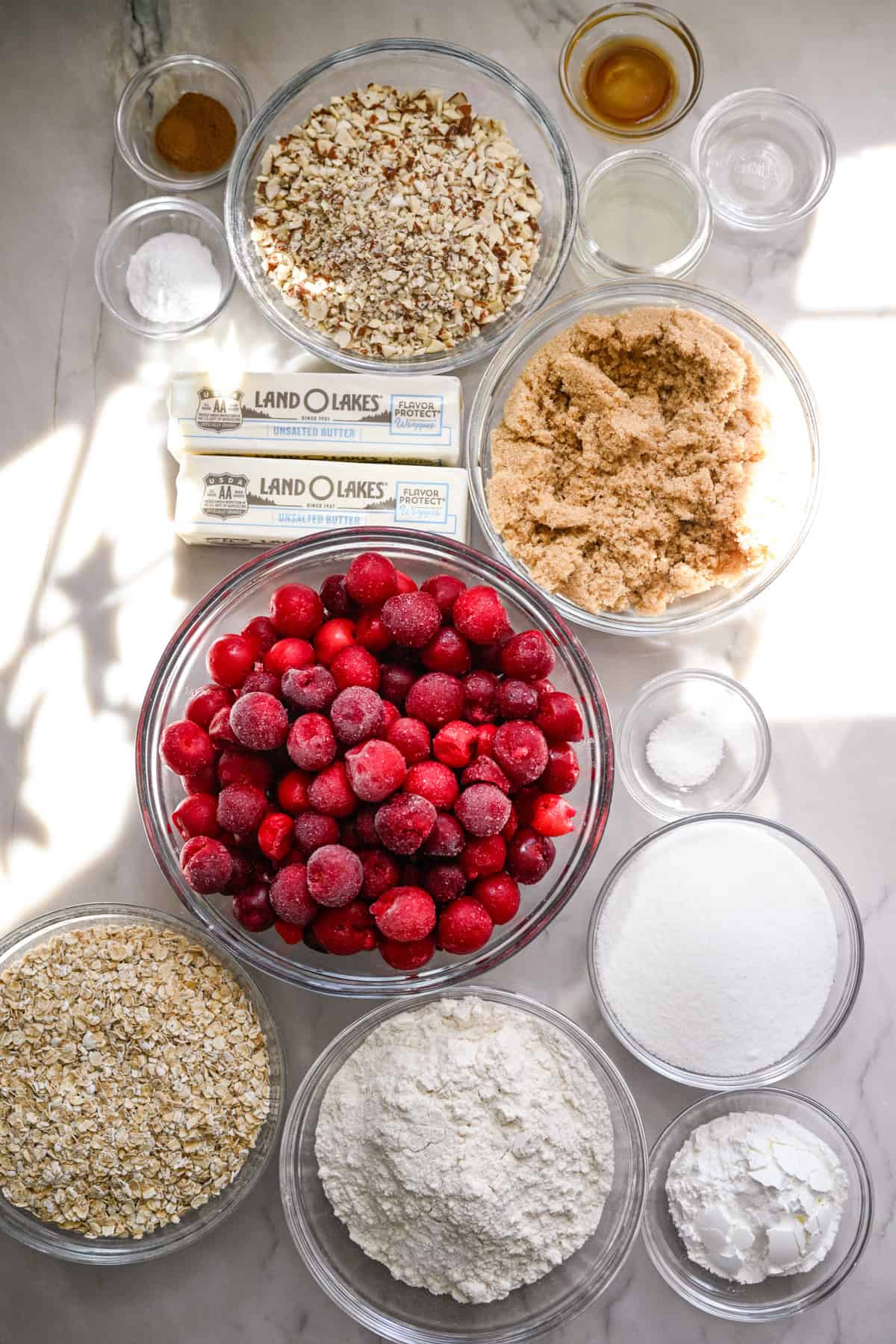 Overhead view of ingredients for cherry pie bars.