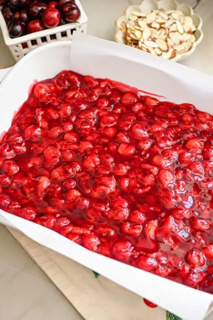 Cherry pie filling on top of crust.