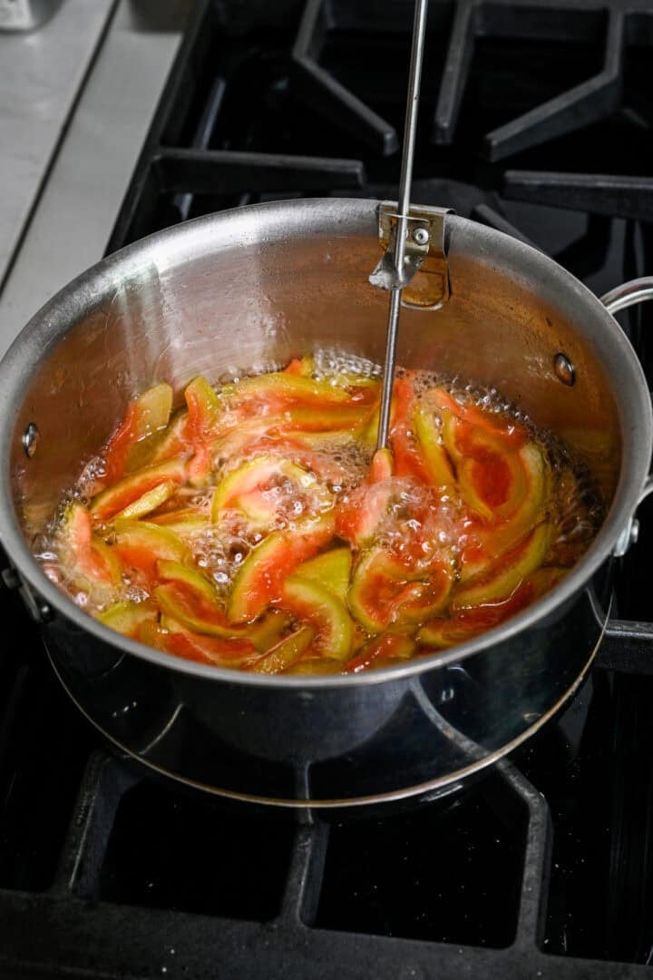 Watermelon rinds during middle of cooking.