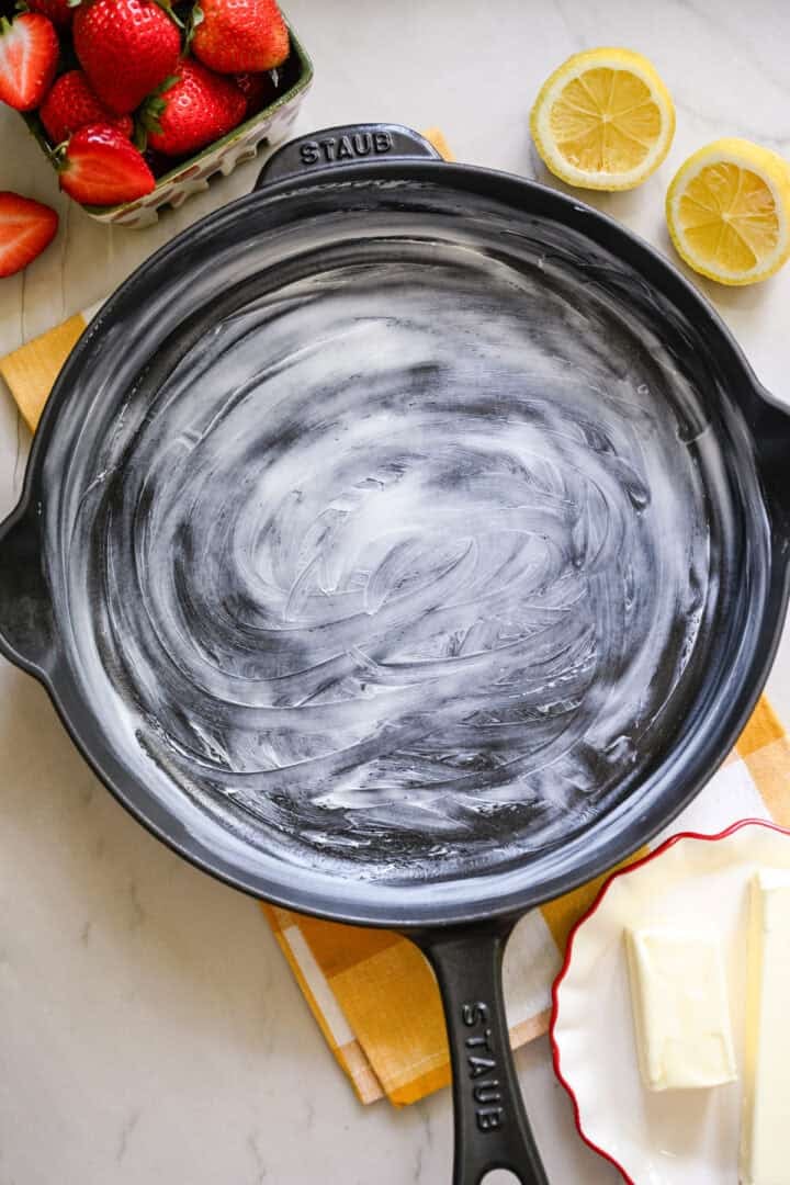 Cast iron skillet greased with lots of butter.