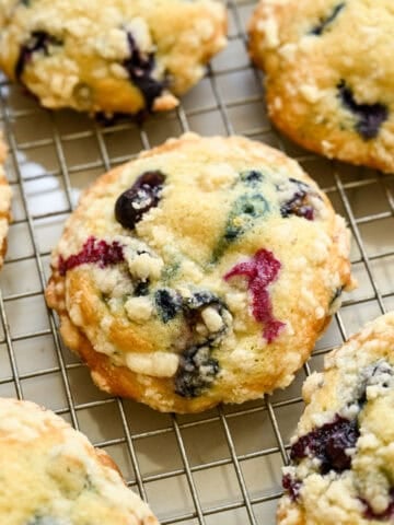 Overhead view of muffin top on a cooling rack.