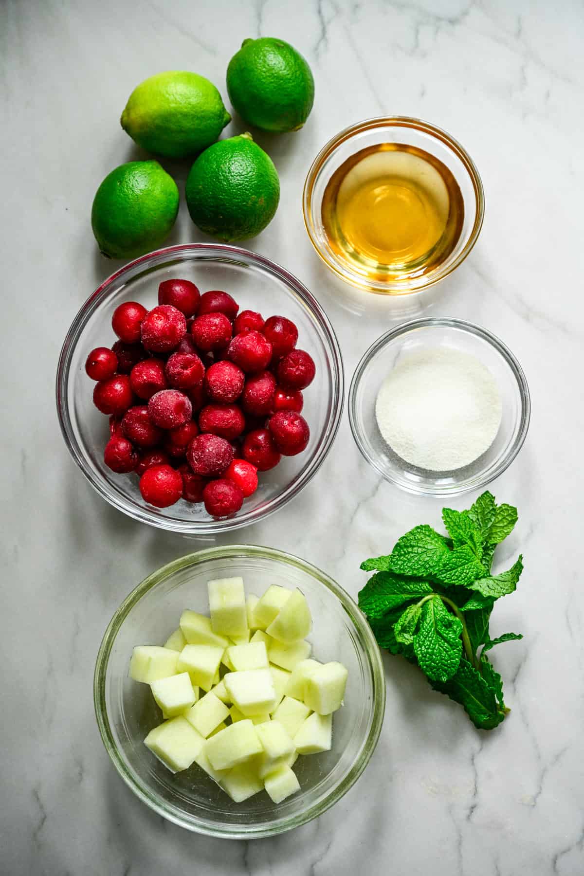 Overhead view of cherry gummy ingredients.