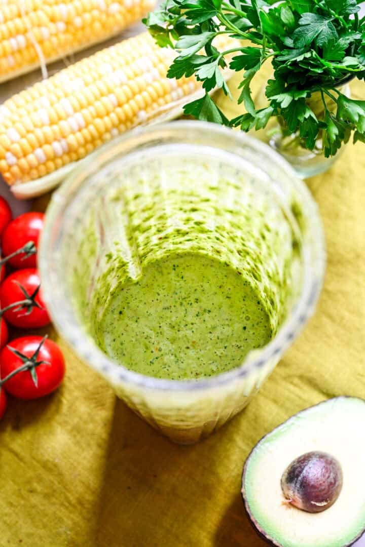Overhead view of chimichurri dressing after blending.