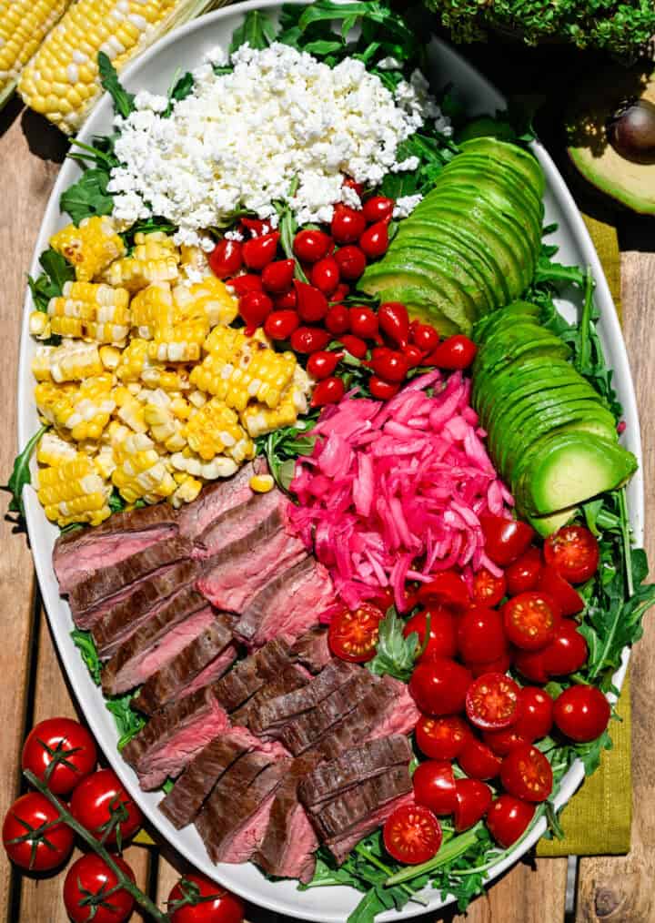 Overhead view of steak salad on a platter