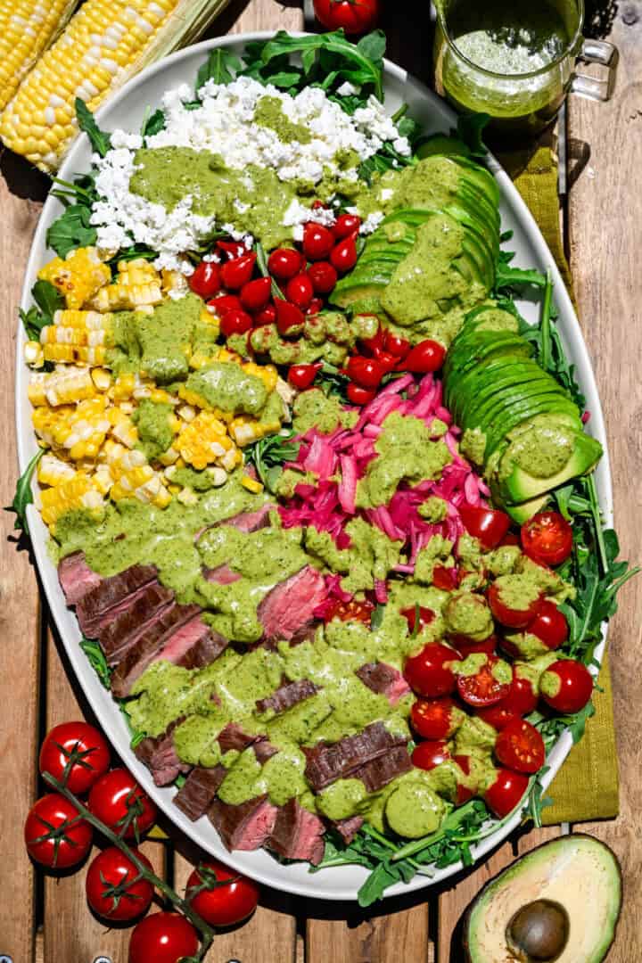 Overhead view of steak salad on a platter