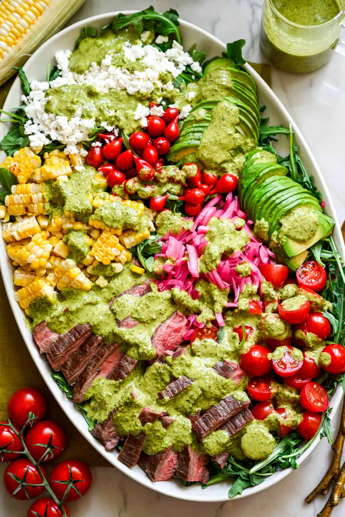 Overhead view of steak salad on a platter