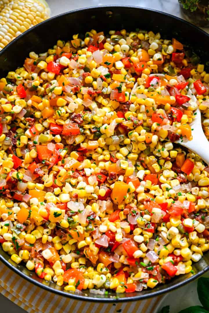 close up overhead view of confetti corn in a skillet.