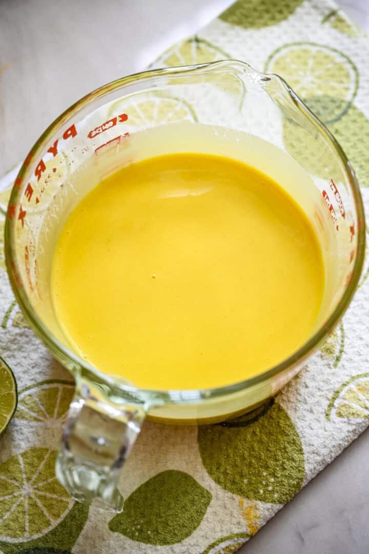 Overhead view of mango posset after straining.